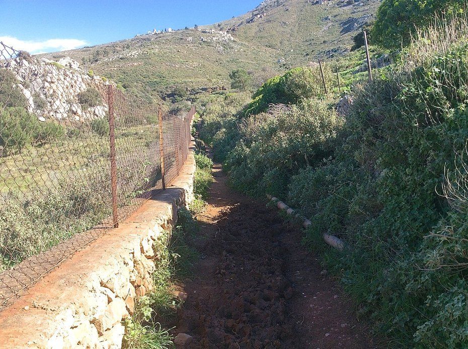 Walking to Aghia Fotini Cemetery and Monastery on Hydra Island Greece.