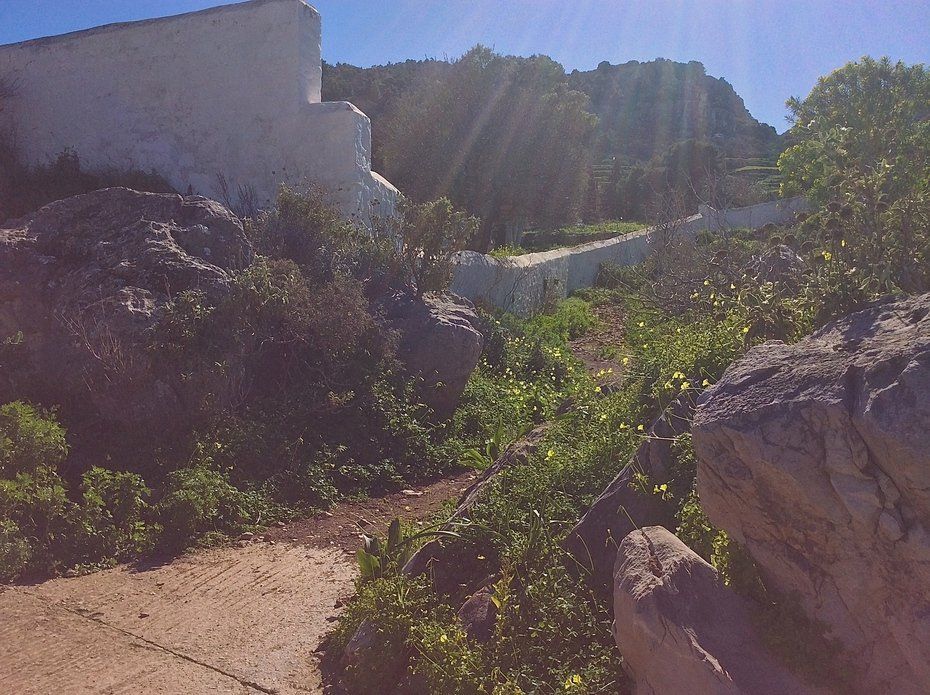 Walking to Aghia Fotini Cemetery and Monastery on Hydra Island Greece.
