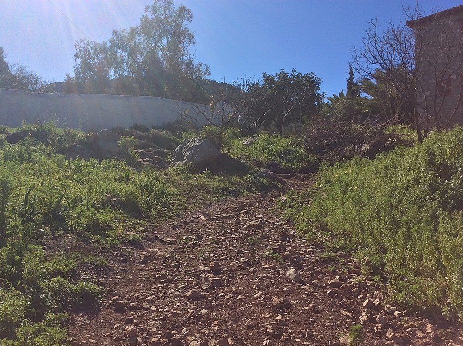 Walking to Aghia Fotini Cemetery and Monastery on Hydra Island Greece.