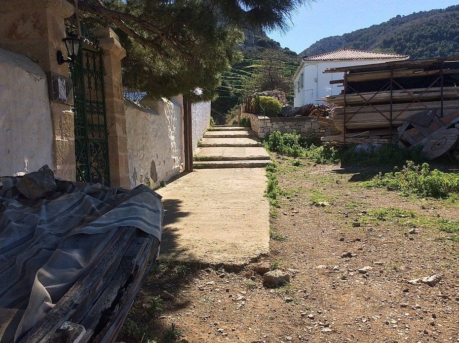 Walking to Aghia Fotini Cemetery and Monastery on Hydra Island Greece.