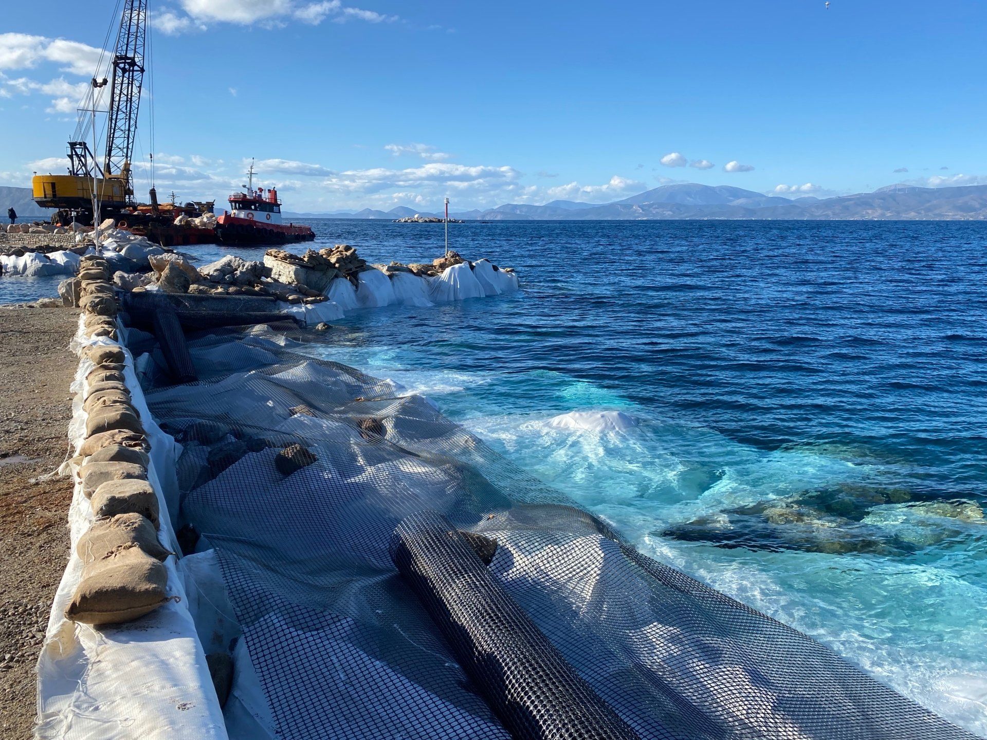 Kamini Harbour sea erosion prevention project on Hydra Island Greece.