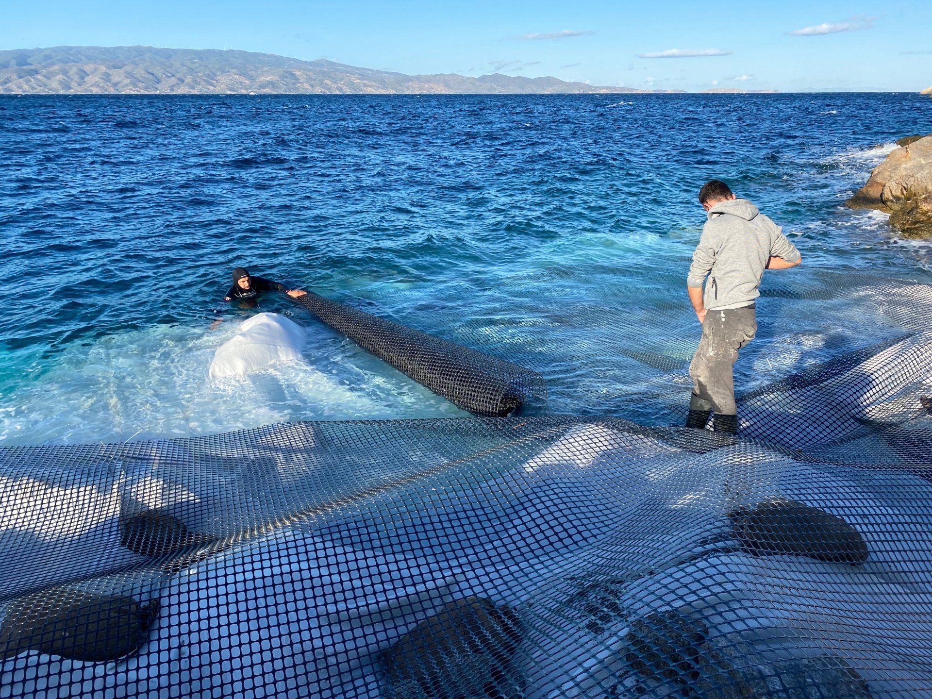 Kamini Harbour sea erosion prevention project on Hydra Island Greece.