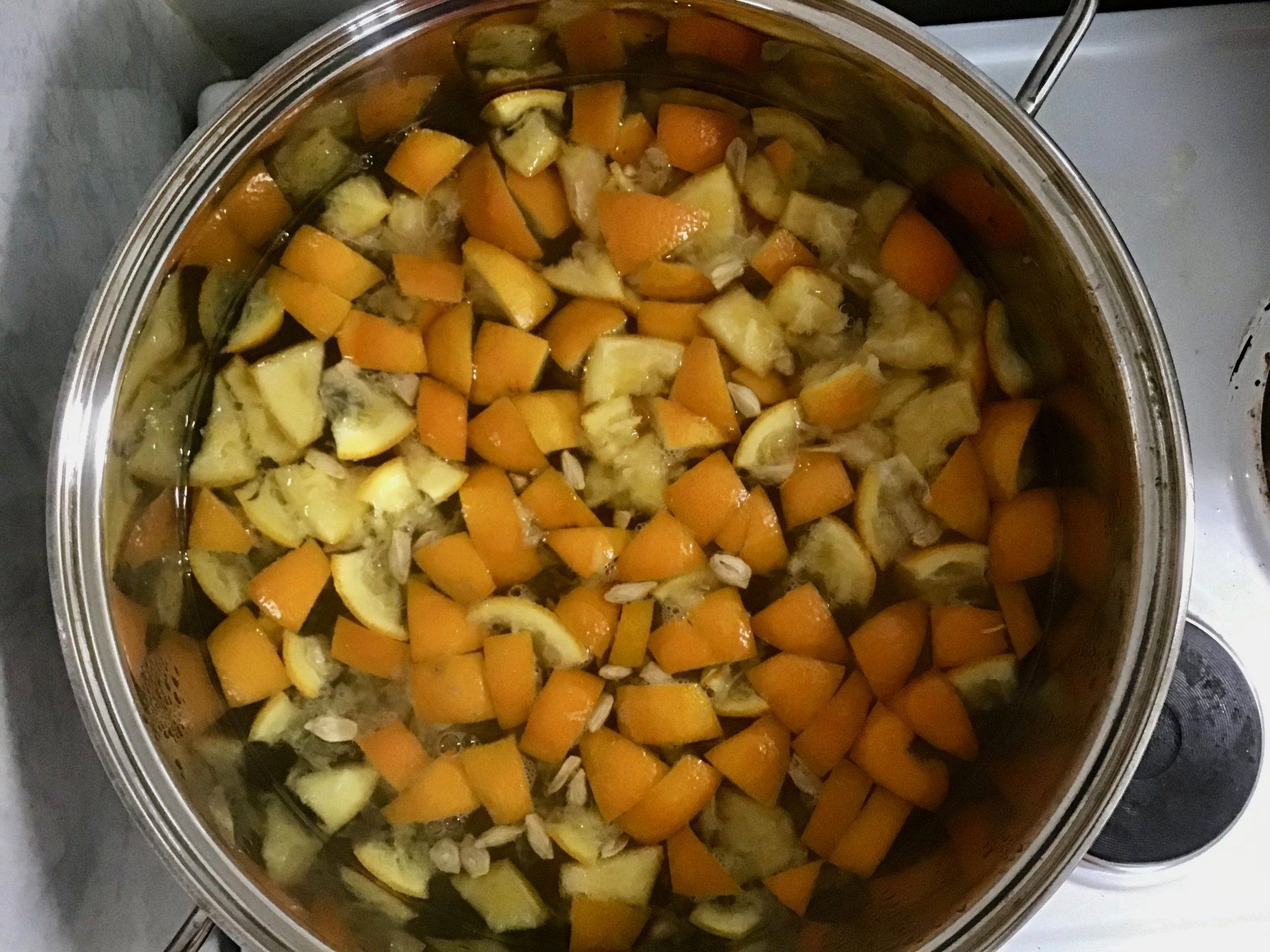 Making marmalade on Hydra Island - Put the skin, pith, pips and juice in the pan and cook for 2 hours.