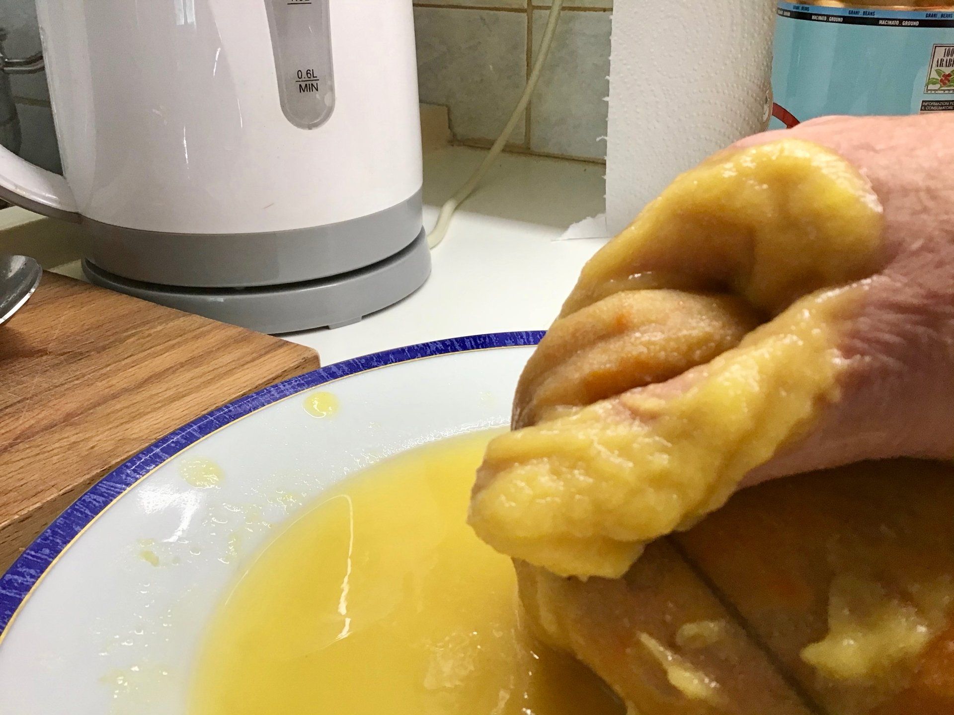 Extracting pectin by hand during marmalade making on Hydra Island Greece.