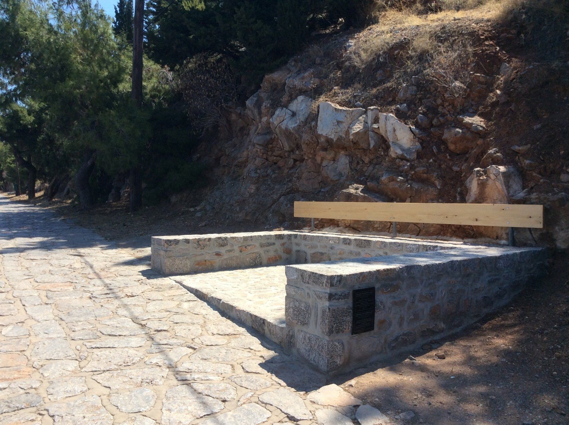 Leonard Cohen memorial bench on Hydra Island Greece.