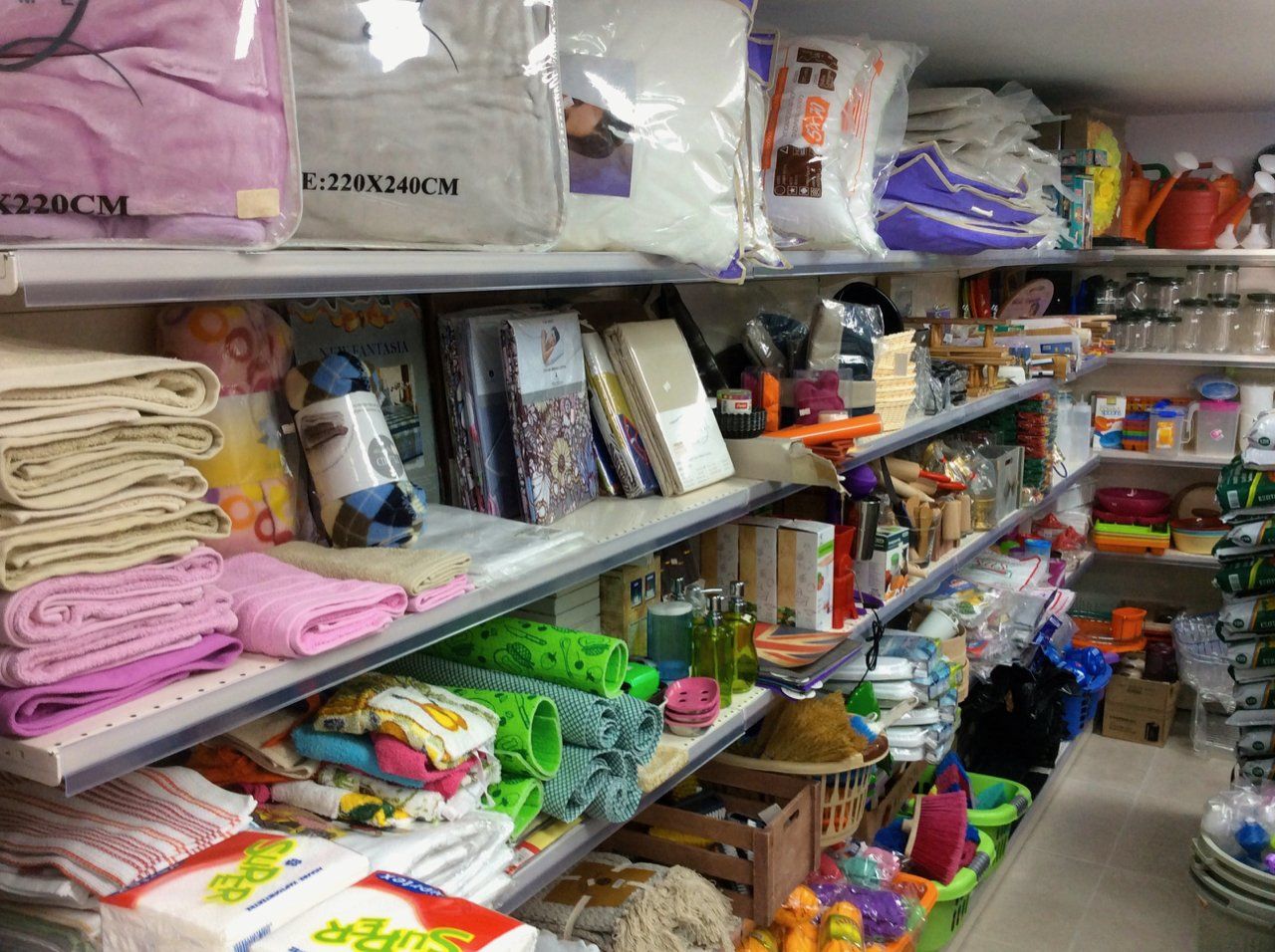 Towels, bedding & plastic containers Kranidiotis Hydra Home shop on Hydra Island in the HydraDirect Shopping & Services pages