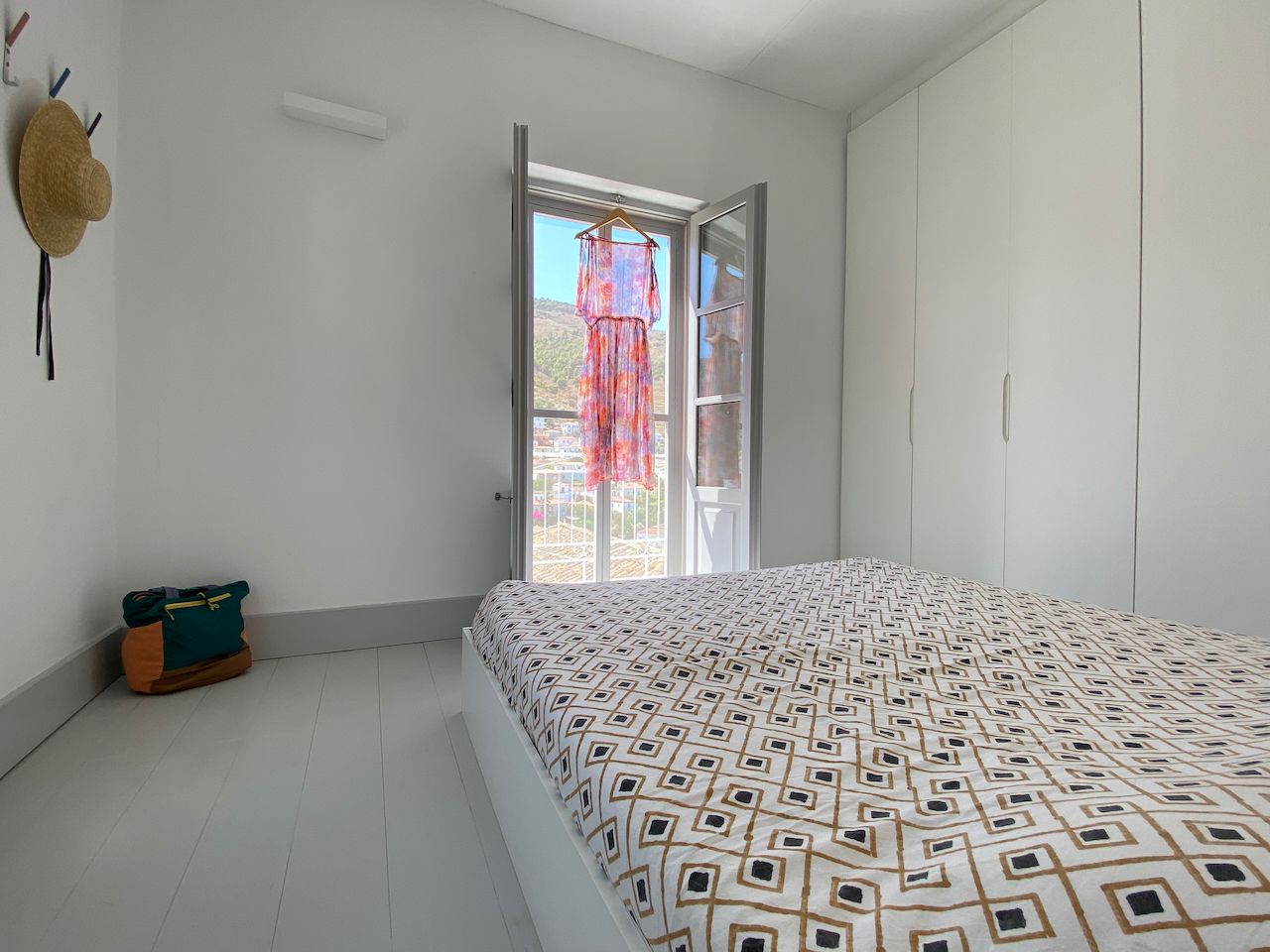Top floor principal bedroom of 2 bedroom holiday house rental on Hydra Island Greece