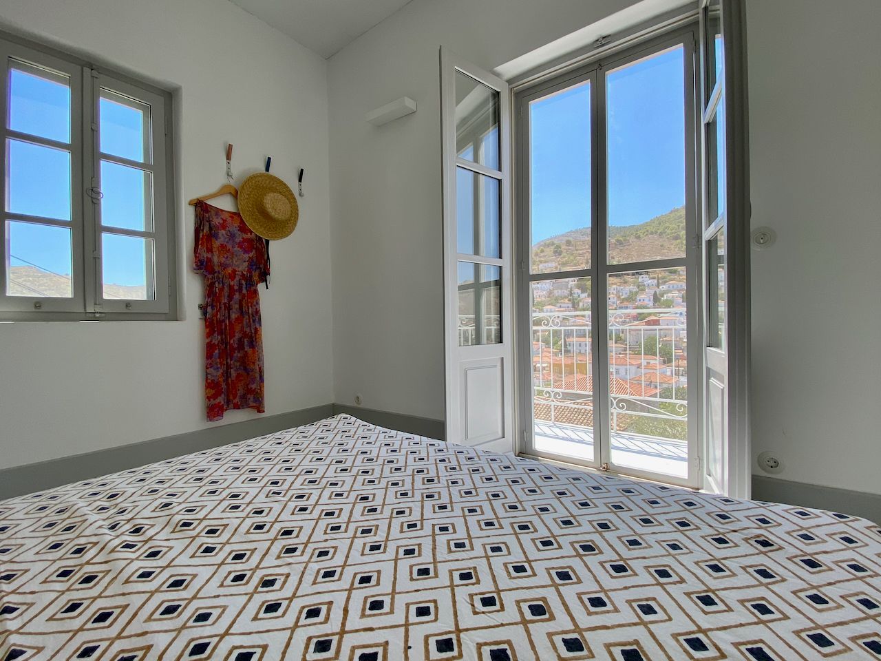 Top floor principal bedroom of 2 bedroom holiday house rental on Hydra Island Greece