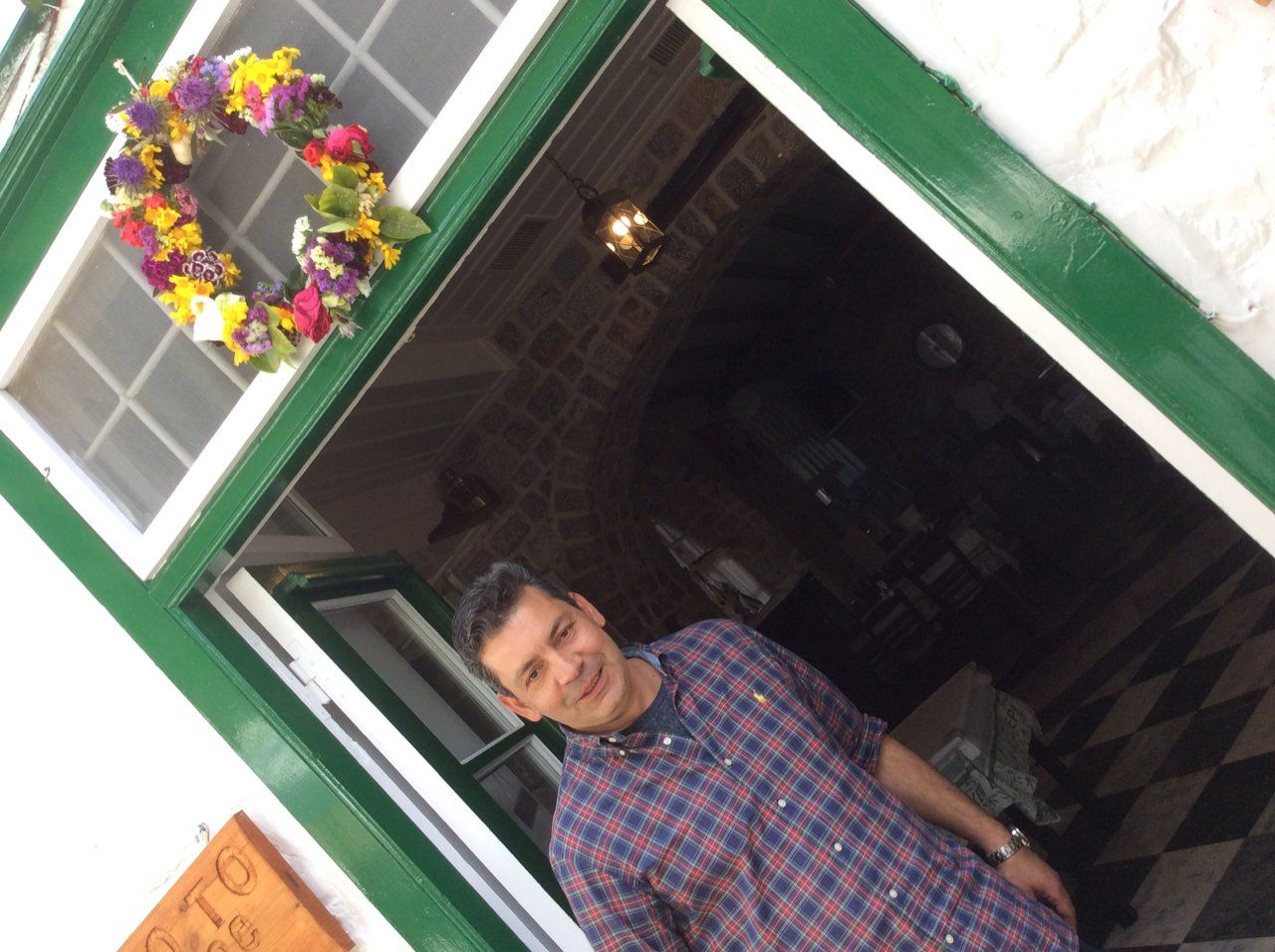 Stavros at Xeri Elia, May day flowers on Hydra Island Greece.
