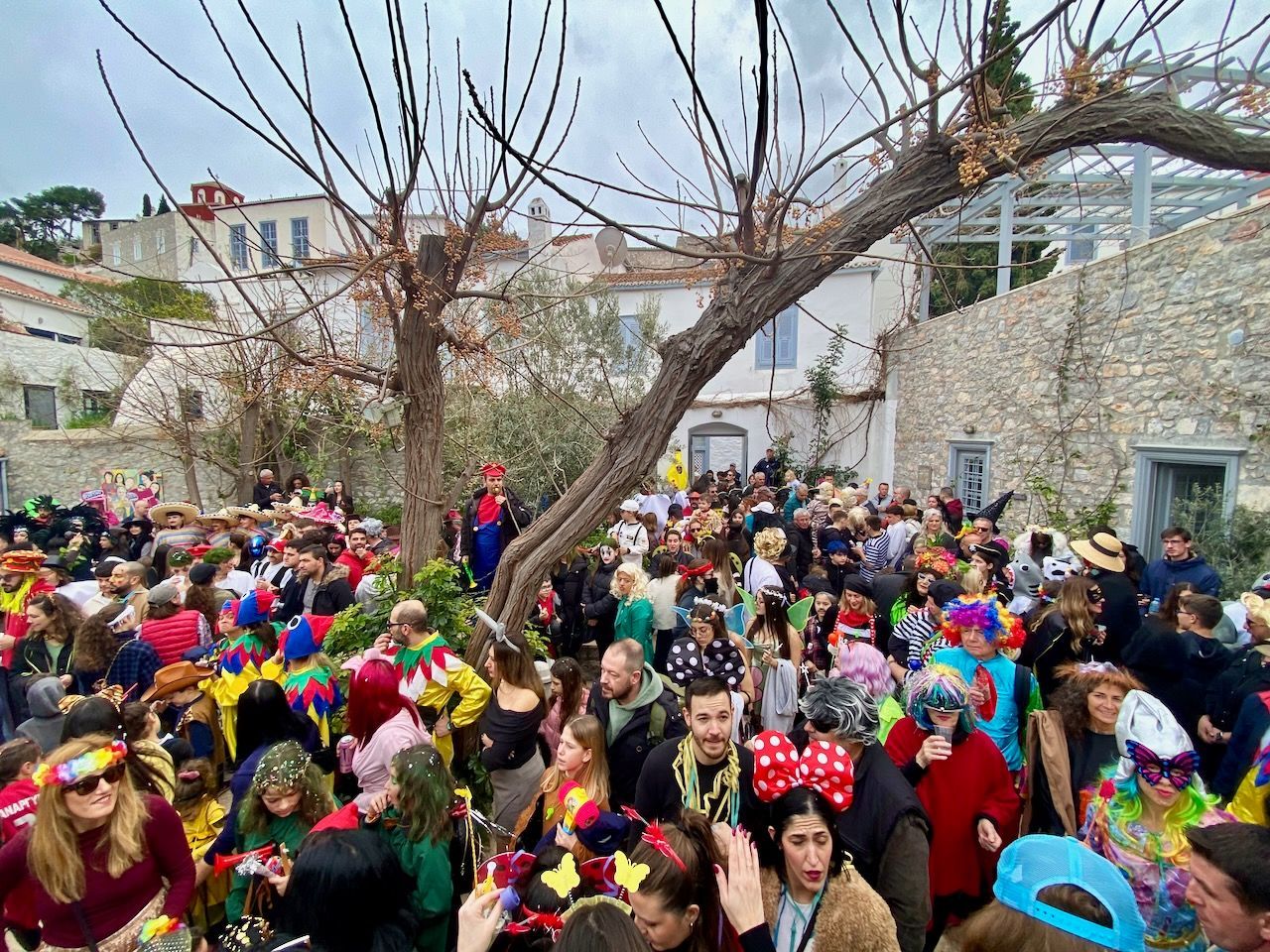 First stop at the Language School on the Carnival Parade Route on Hydra Island Greece 2025