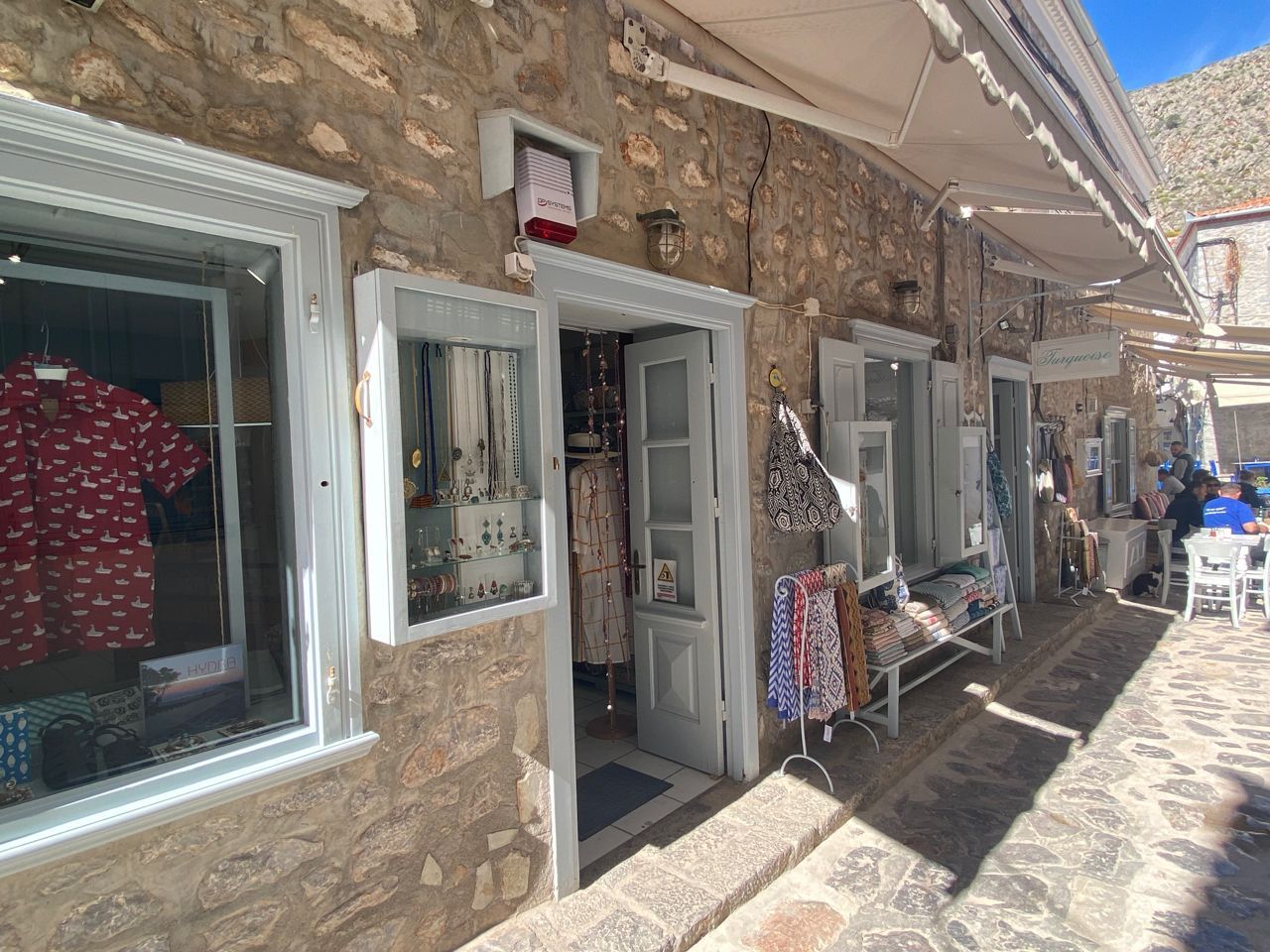 direct contact details for turquoise fashion shop, handcrafted garments, linens & accessories on hydra island greece.