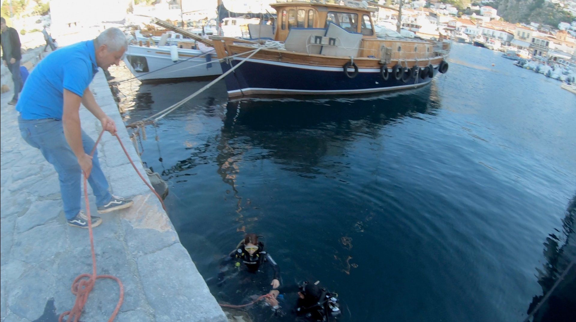 Oct 31 2020 Cleanup operation of seabed rubbish in Hydra Harbour on Hydra Island Greece.