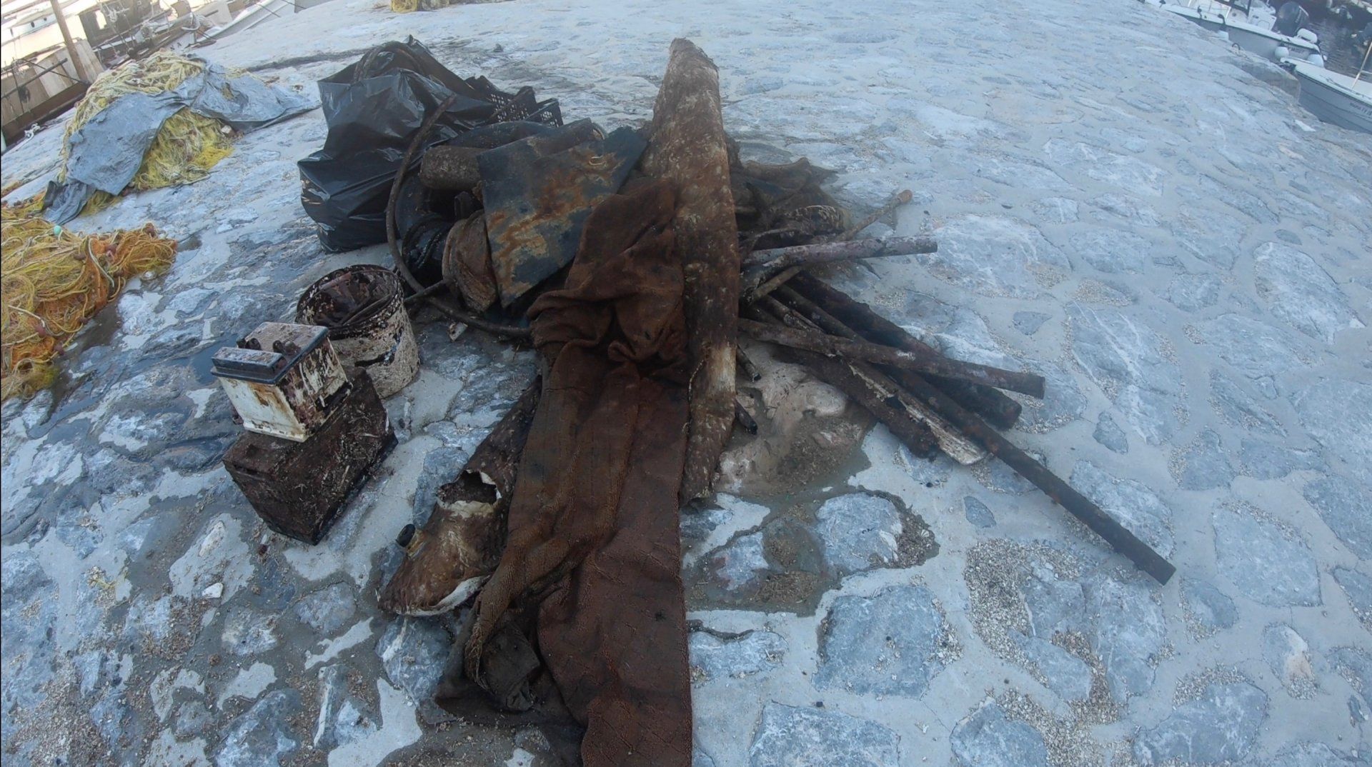 Oct 31 2020 Cleanup operation of seabed rubbish in Hydra Harbour on Hydra Island Greece.