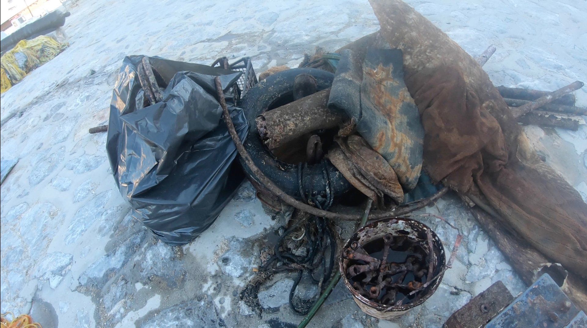 Oct 31 2020 Cleanup operation of seabed rubbish in Hydra Harbour on Hydra Island Greece.