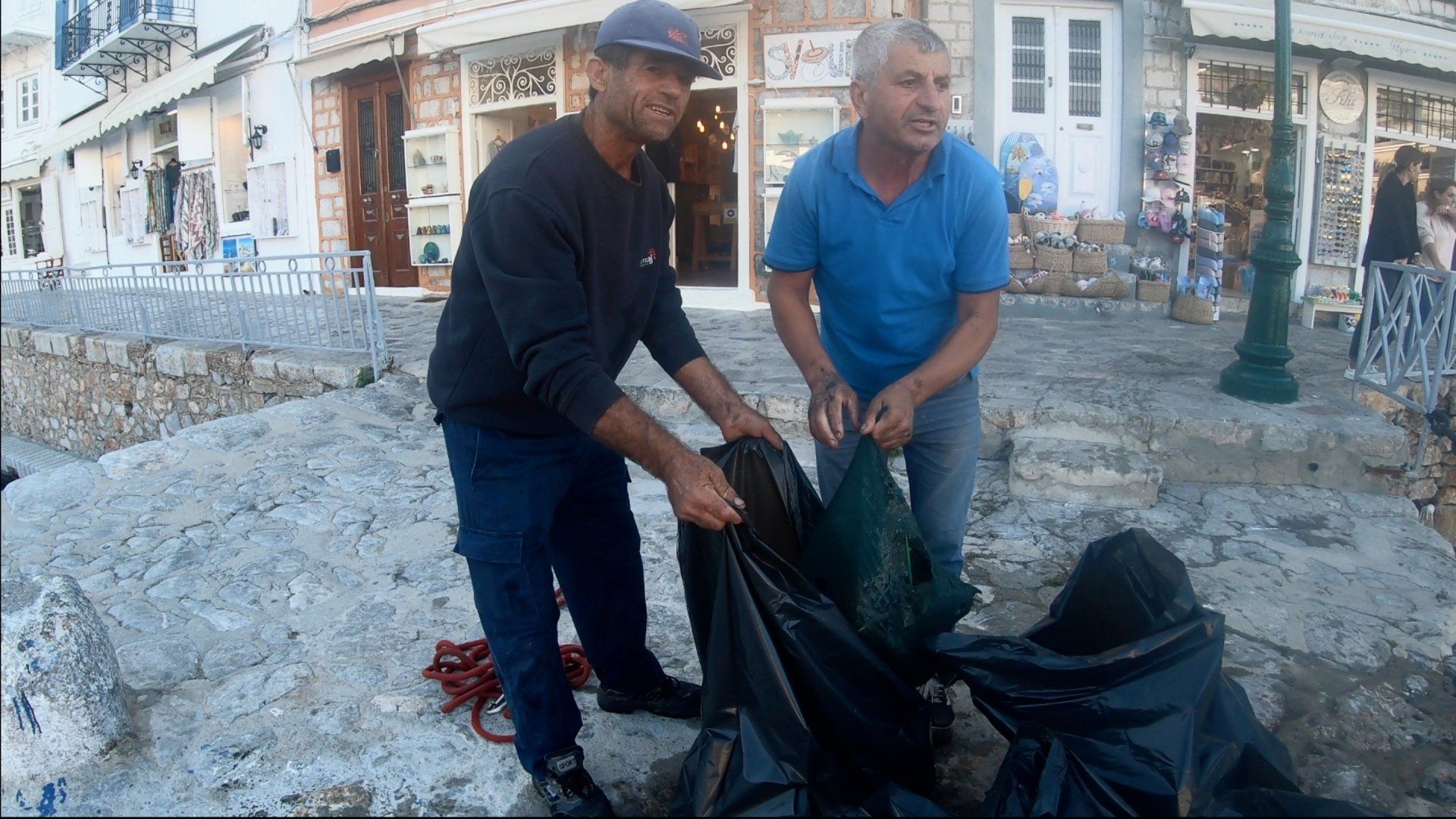 Oct 31 2020 Cleanup operation of seabed rubbish in Hydra Harbour on Hydra Island Greece.