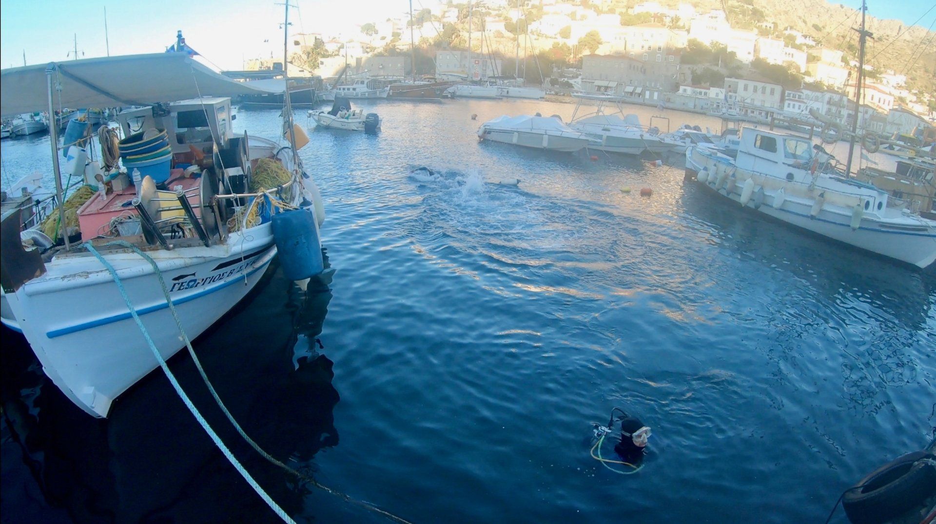 Oct 31 2020 Cleanup operation of seabed rubbish in Hydra Harbour on Hydra Island Greece.
