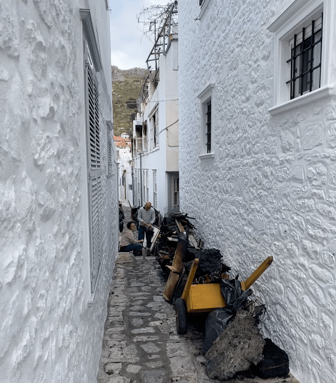 Post fire clean up on Hydra Island Greece