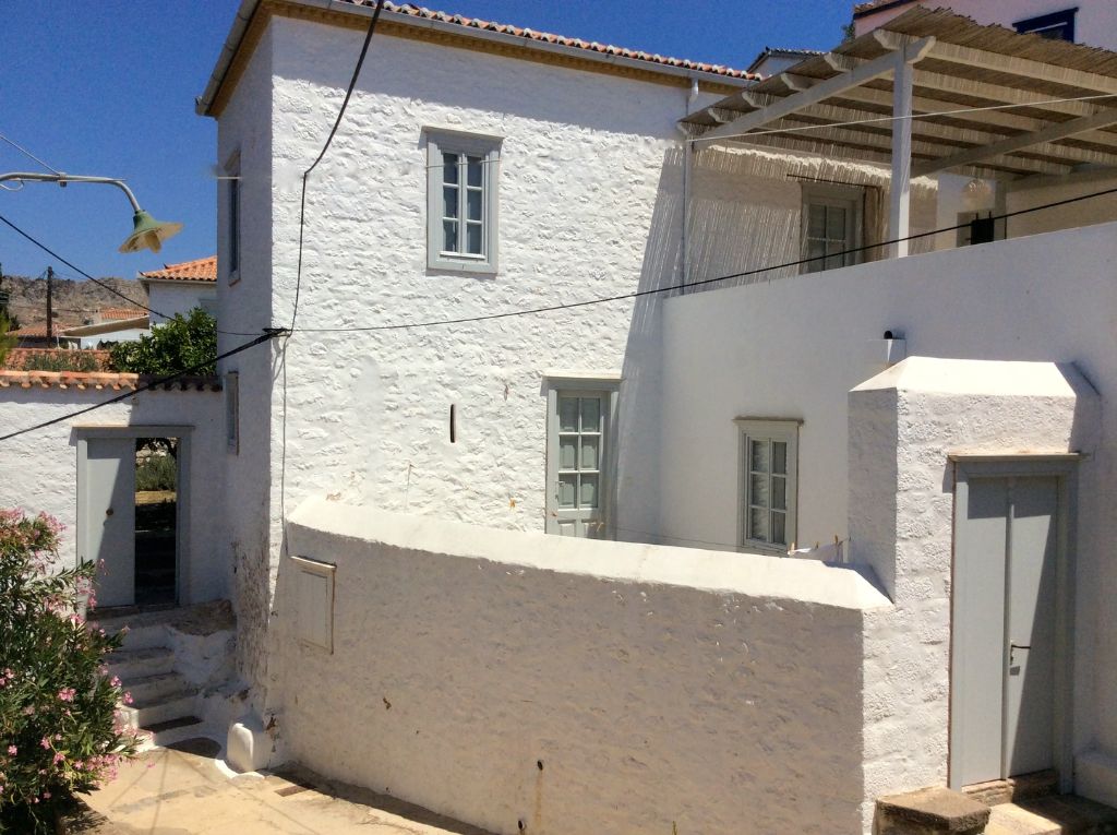 Main building at Arineso Family Villa, holiday house to rent in Kamini on Hydra Island Greece.