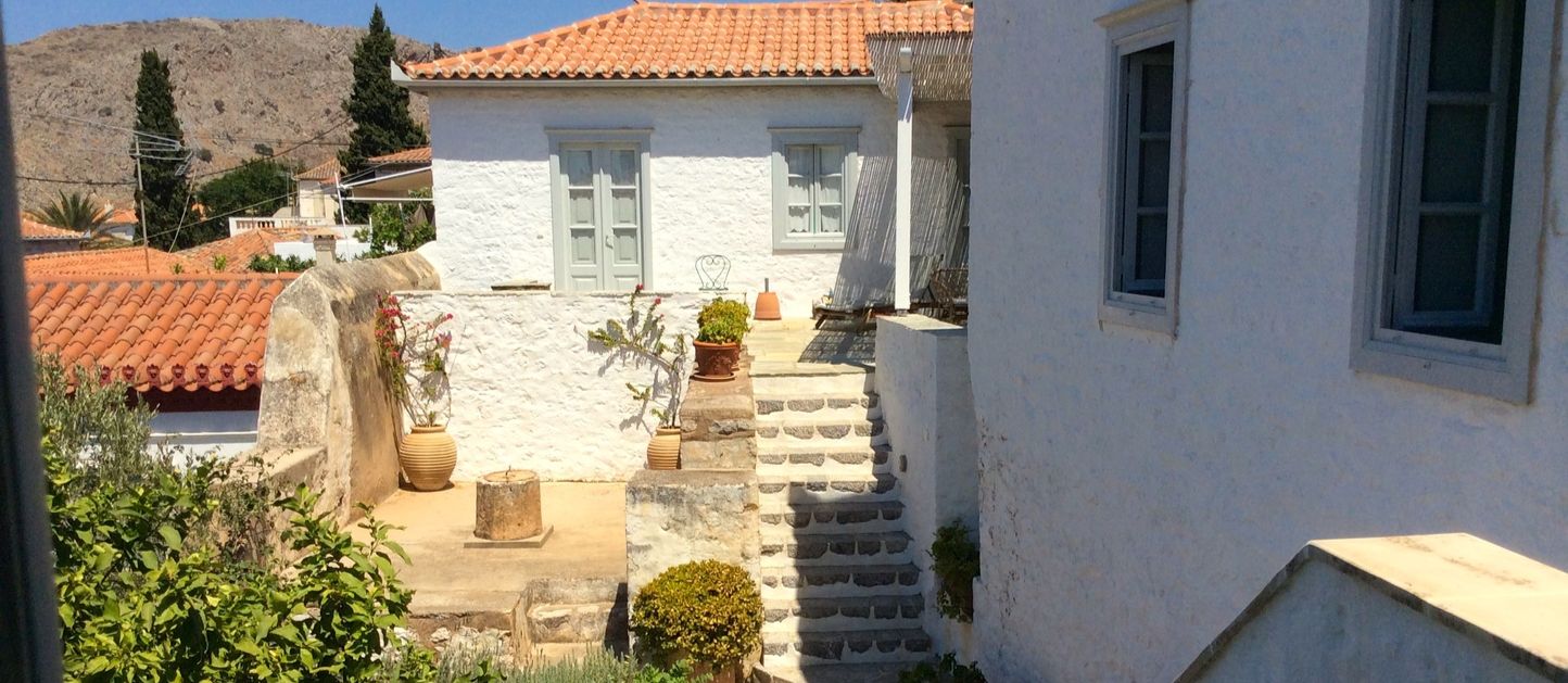 Main building at Arineso Family Villa, holiday house to rent in Kamini on Hydra Island Greece.