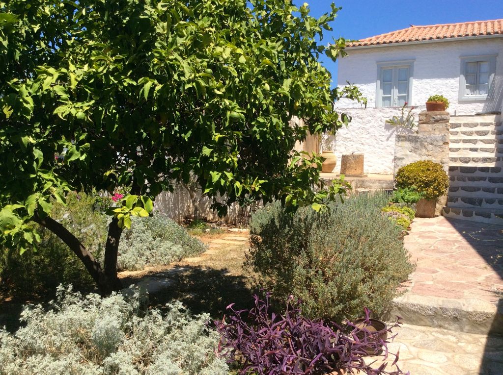 Main building at Arineso Family Villa, holiday house to rent in Kamini on Hydra Island Greece.