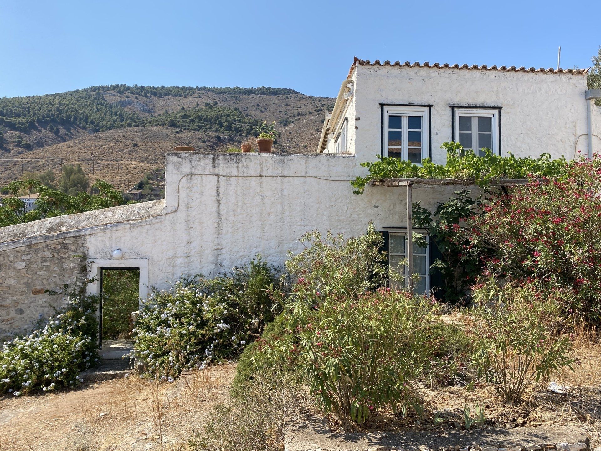 Traditional Kamini house for sale on Hydra Island Greece