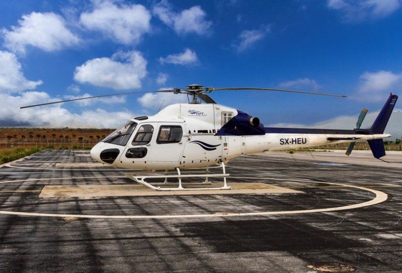 Helicopter to Kivitos Helicopter service from AIA to Hydra Island, landing on Kivitos islet followed by 3 min sea taxi ride into Hydra Harbour