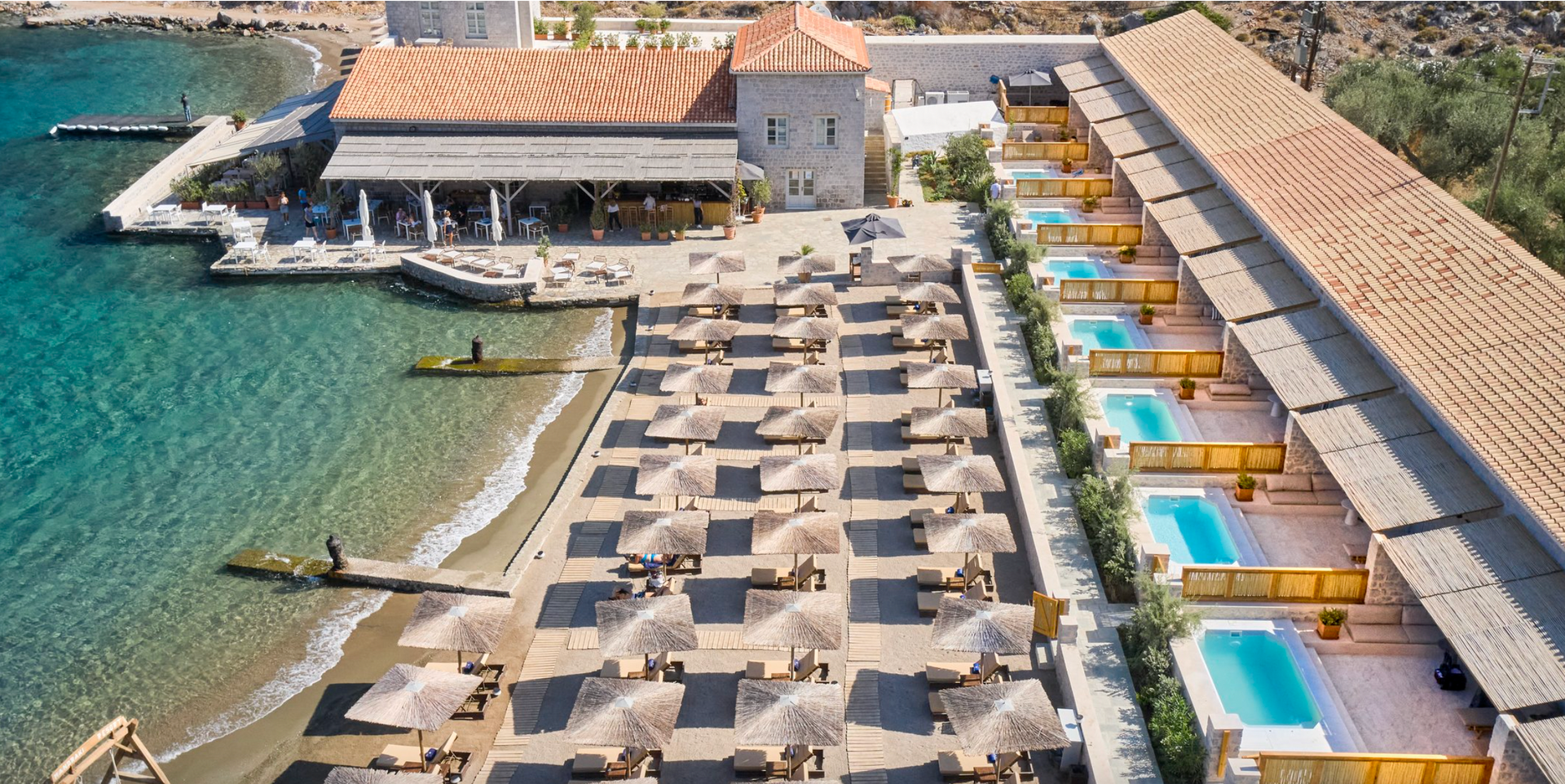 book direct so no agency fees no commission, at the mandraki beach resort hotel on hydra island greece.