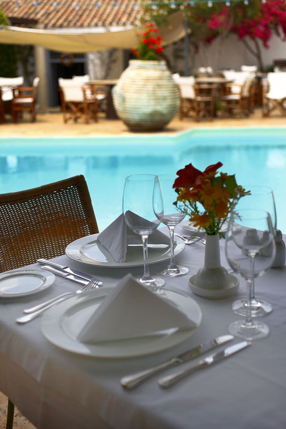 Breakfast next to the pool at Bratsera Hotel - Hydra hotels, accommodation on Hydra Island Greece.