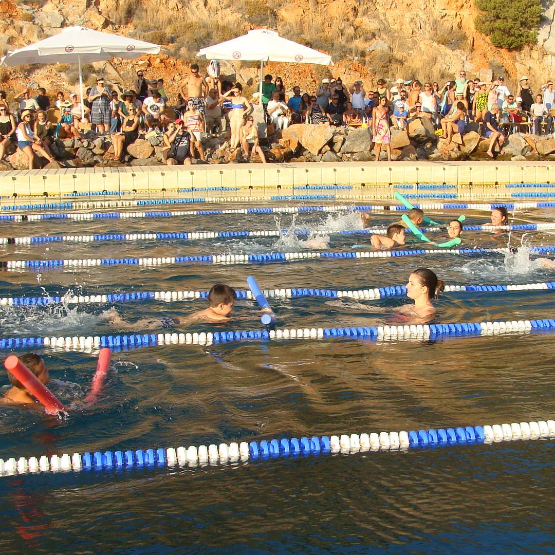 Community children's swimming lessons on Hydra Island Greece.