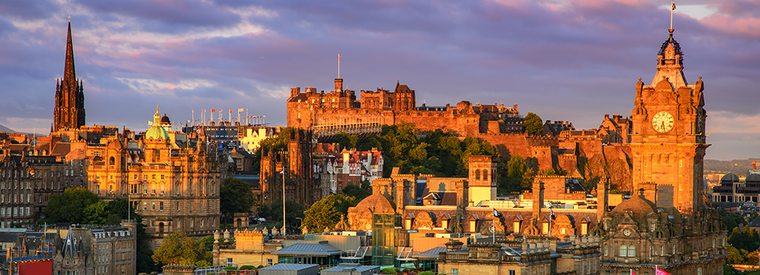 Edinburgh and castle as the sun comes up.