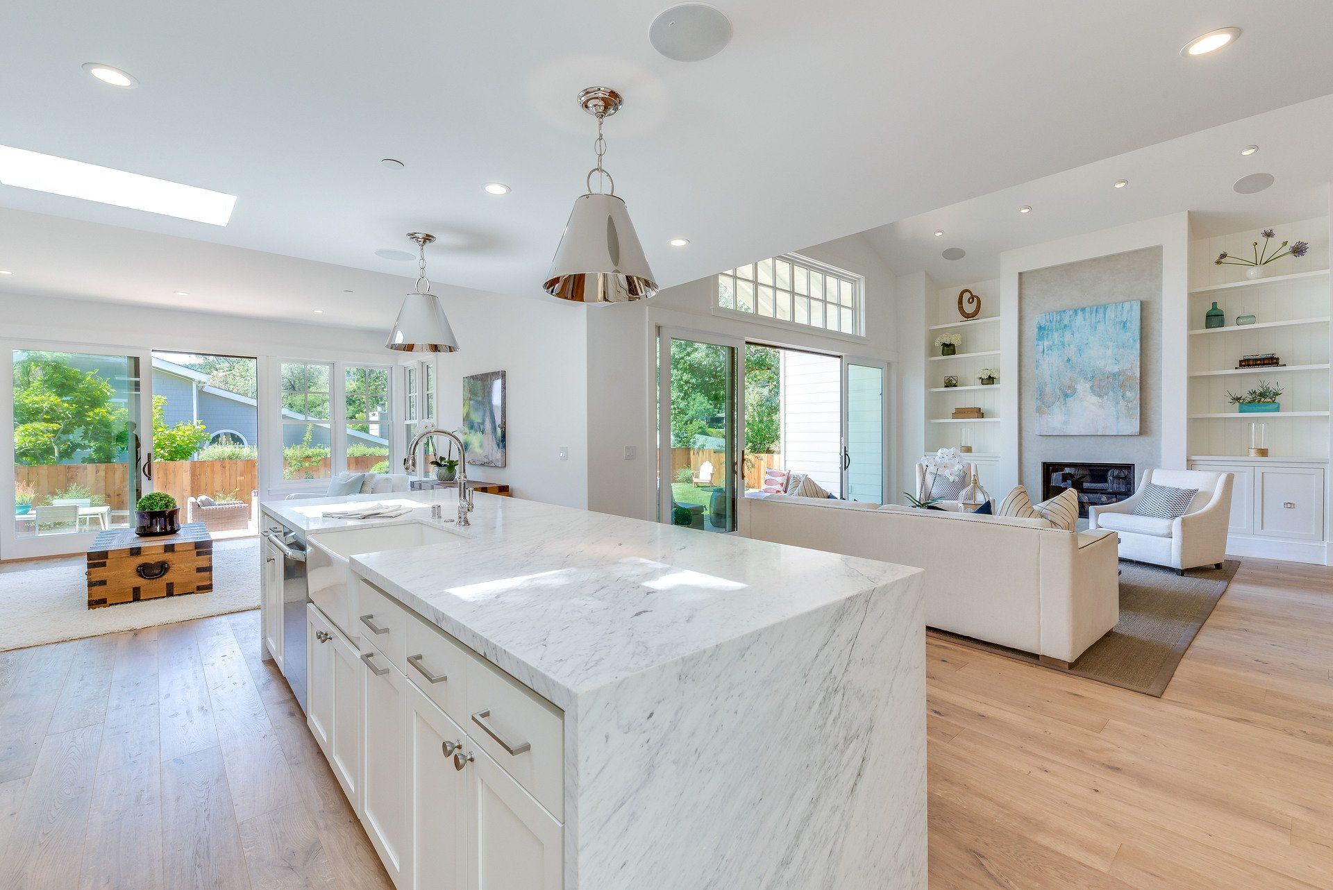 Bianco carrara marble waterfall countertop, modern kitchen living, in a Kentfield home