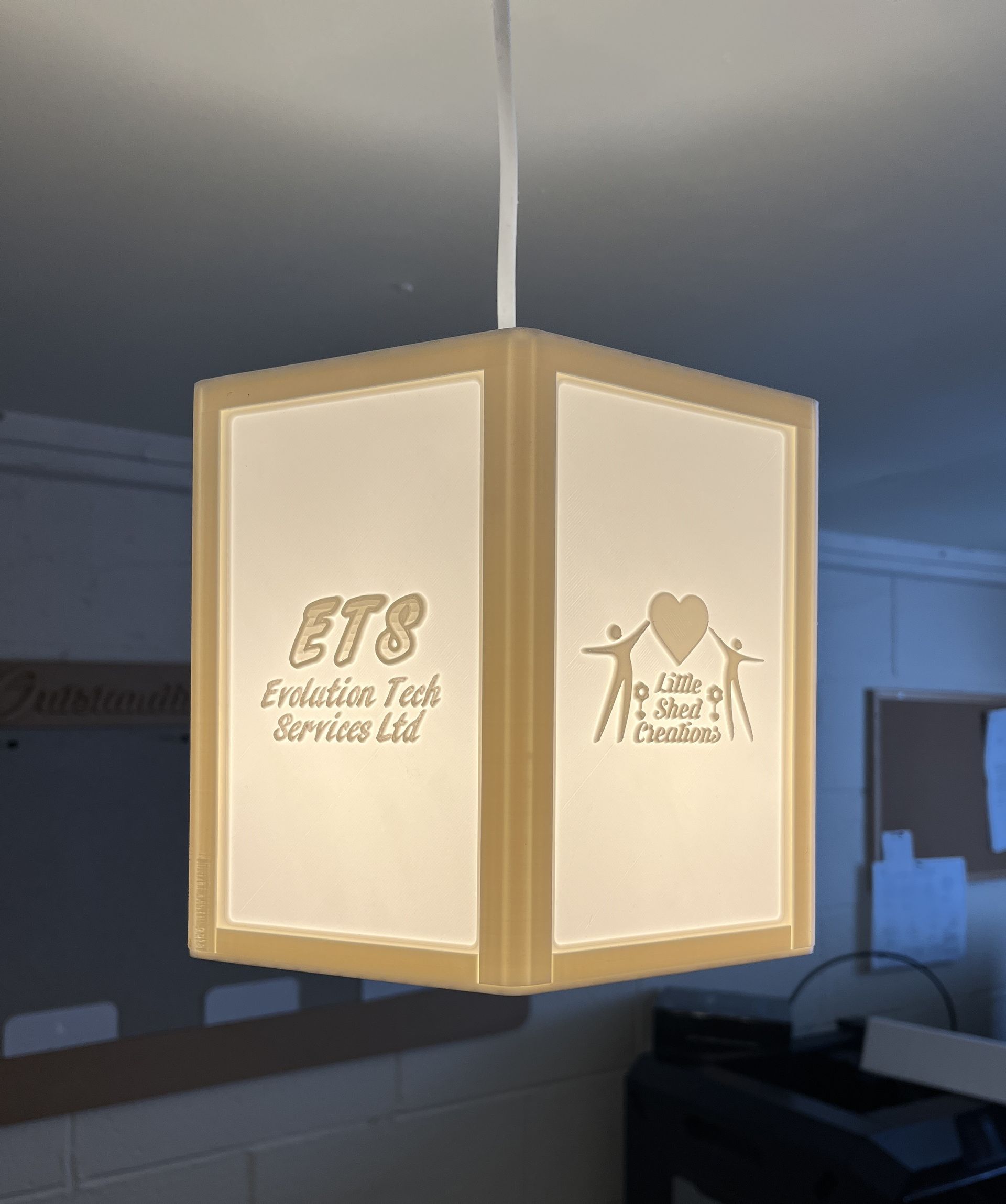 Lithophane logo lampshade 3D printed in white PLA