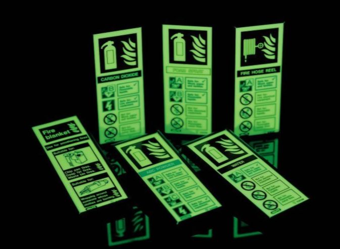 Photoluminescent extinguisher ID signs that glow bright