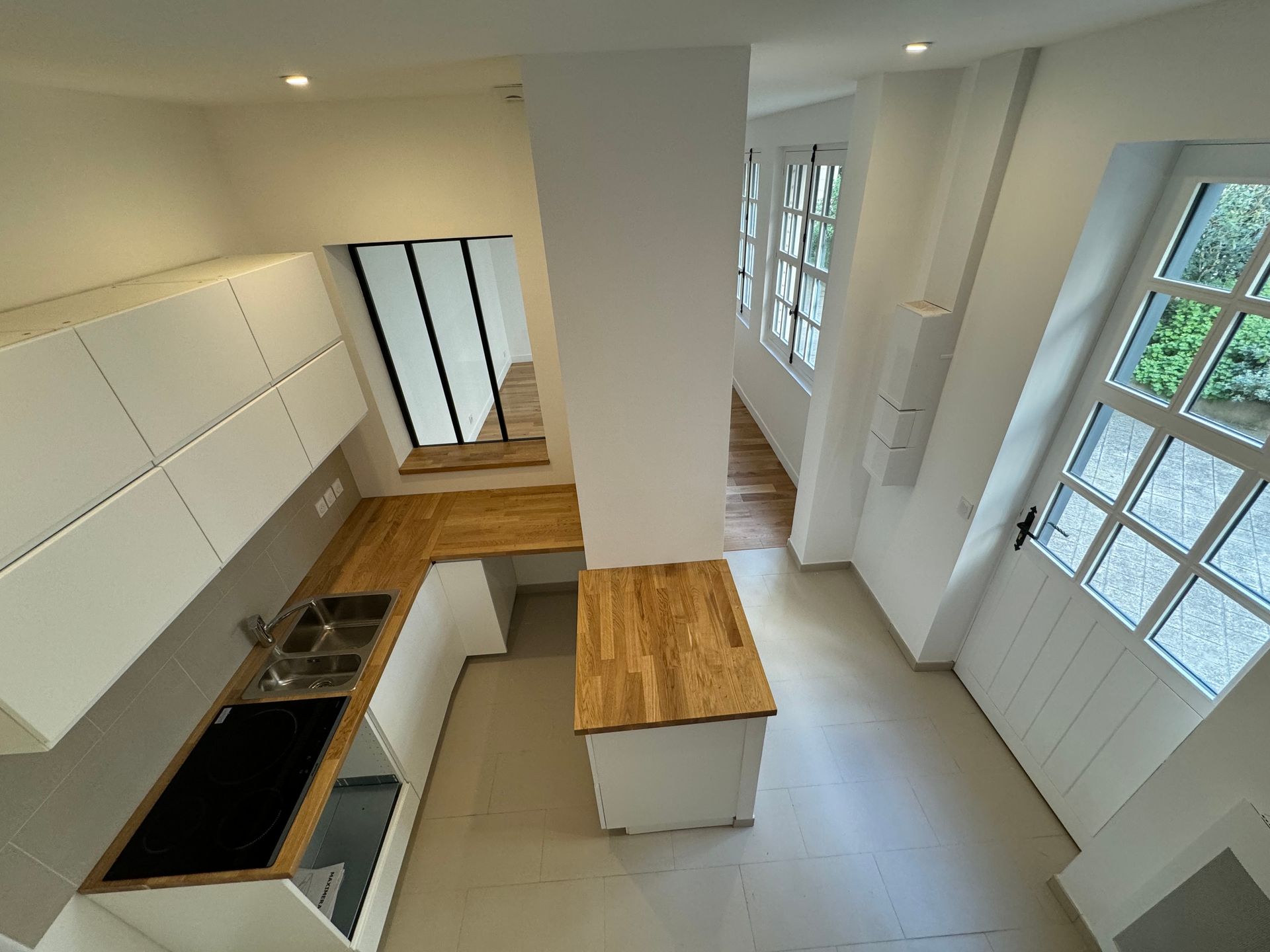 transformation d'un atelier en rdc en appartement place du palais bourbon