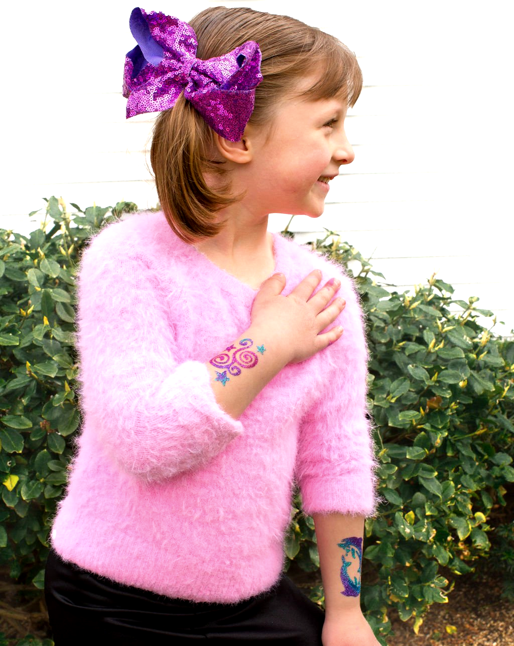 girl with swirl tattoo