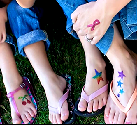 Glitter tattoos at fundraiser