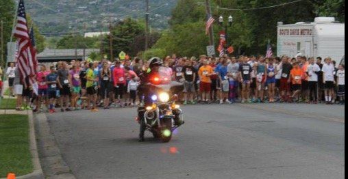 Policeman in front of a race