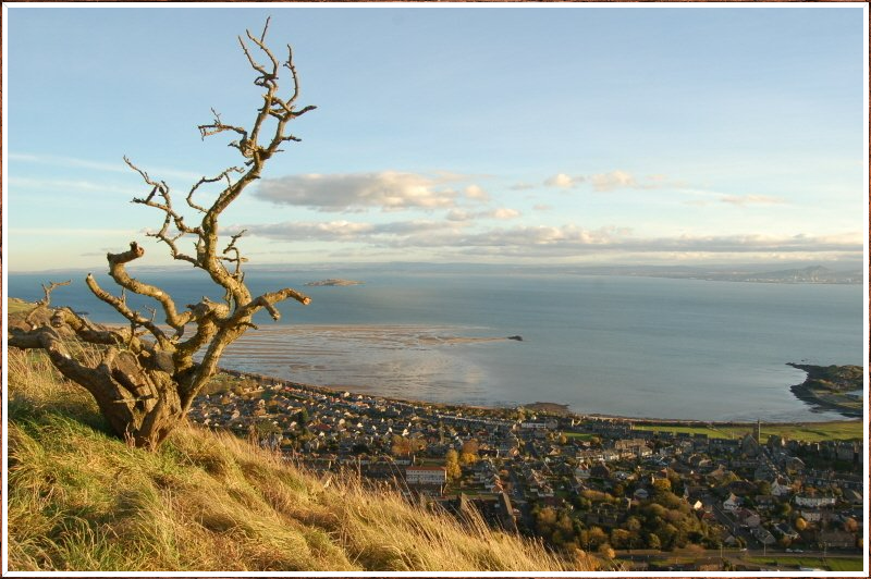 Ian Archibald on The Binn summit looking over Burtnisland in 2012