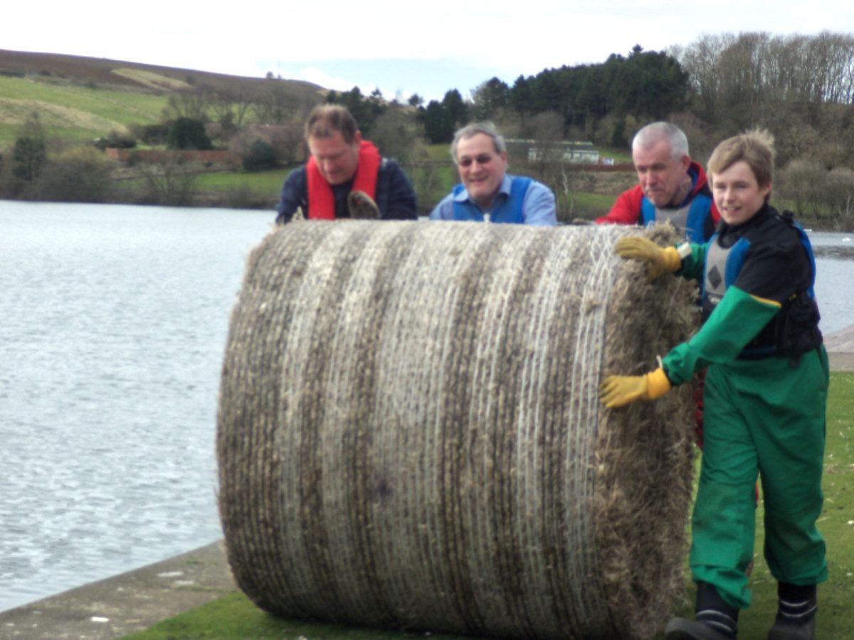 Straw bale to fluff up and put out on the loch.