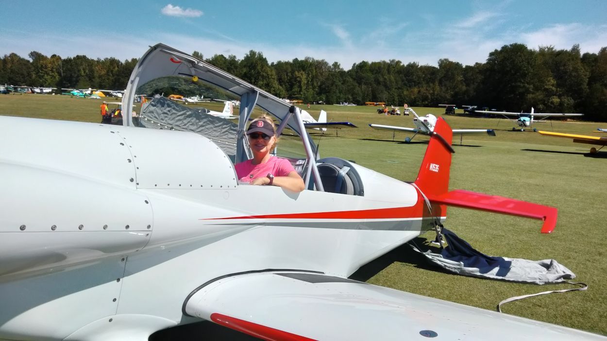 Gina M. Longo in the cockpit of a Van's RV/7.
