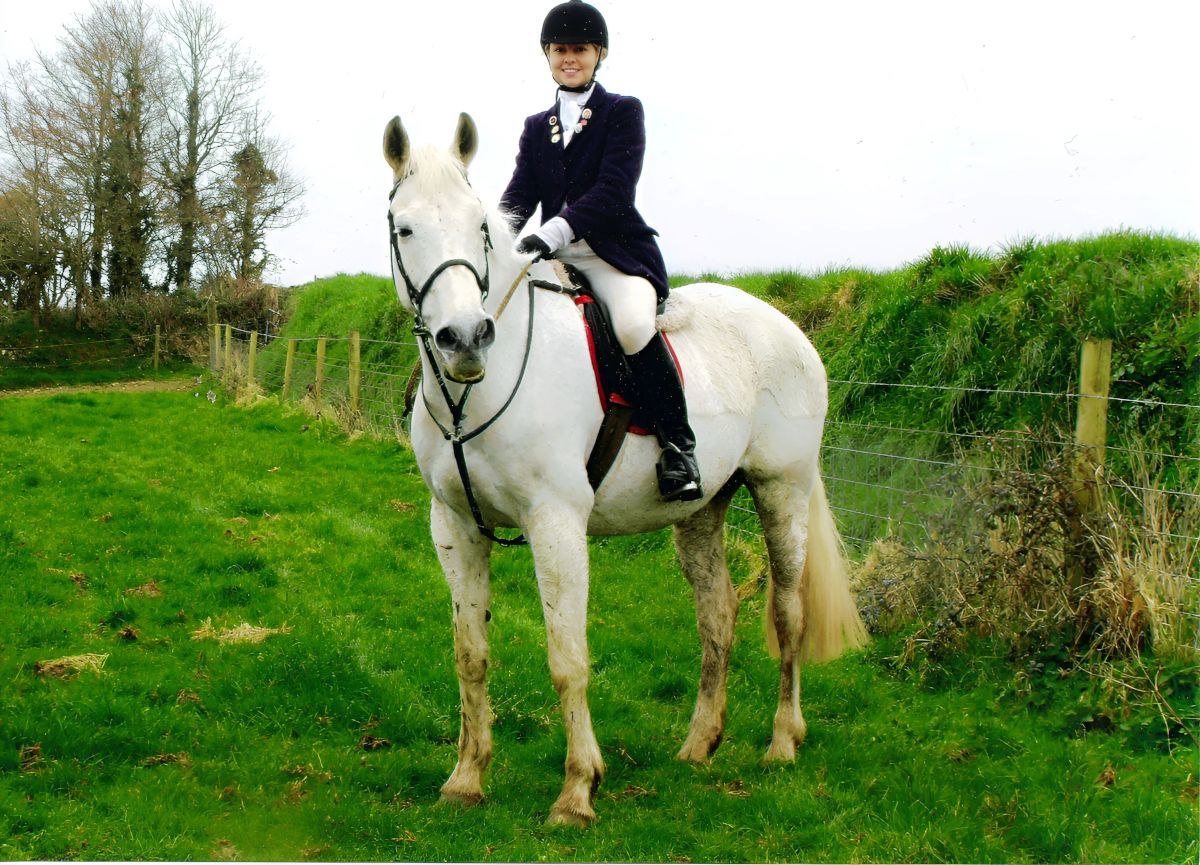 Gina M. Longo on horseback.