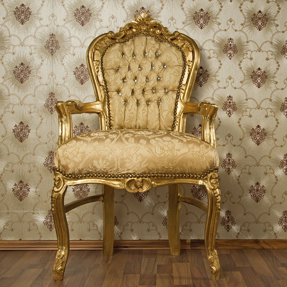 upholstery gold cahir with decorative wallpaper in background