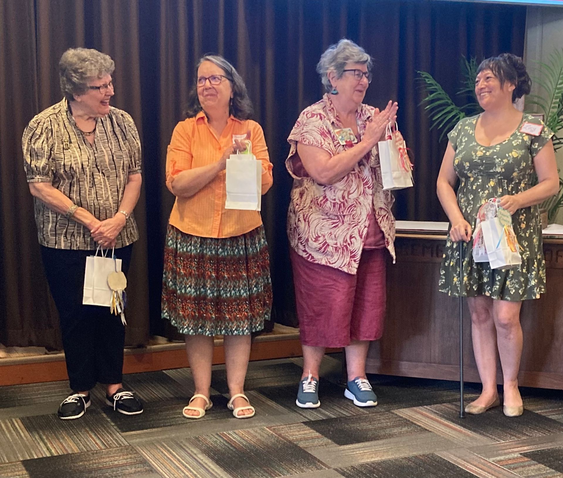 Our 2023 Award Winners! From left to right: Carolyn Skei (2nd Place), Christine Miller (3rd Place), Reid Barnhart (Best Interpretation of Theme), Lucia Miron (Best of Show & Viewer's Choice). Our 2023 Award Winners! From left to right: Carolyn Skei (2nd Place), Christine Miller (3rd Place), Reid Barnhart (Best Interpretation of Theme), Lucia Miron (Best of Show & Viewer's Choice).