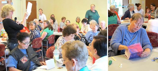 DAFA member Lisa Covert (standing at left) explains pamphlet stitch to a full house of mini-workshop participants. At right, Early Irwin concentrates on her two-part journal with marbled cover.