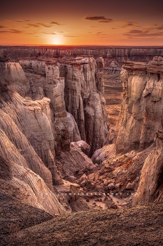 Sunset on the bluffs and hoodoos in Coal Canyon, Arizona