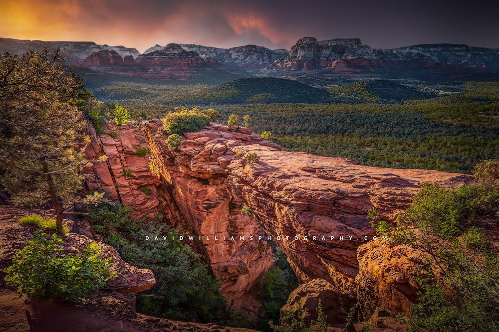 A stormy sunset at Devil's Bridge Arch, Sedona, Arizona