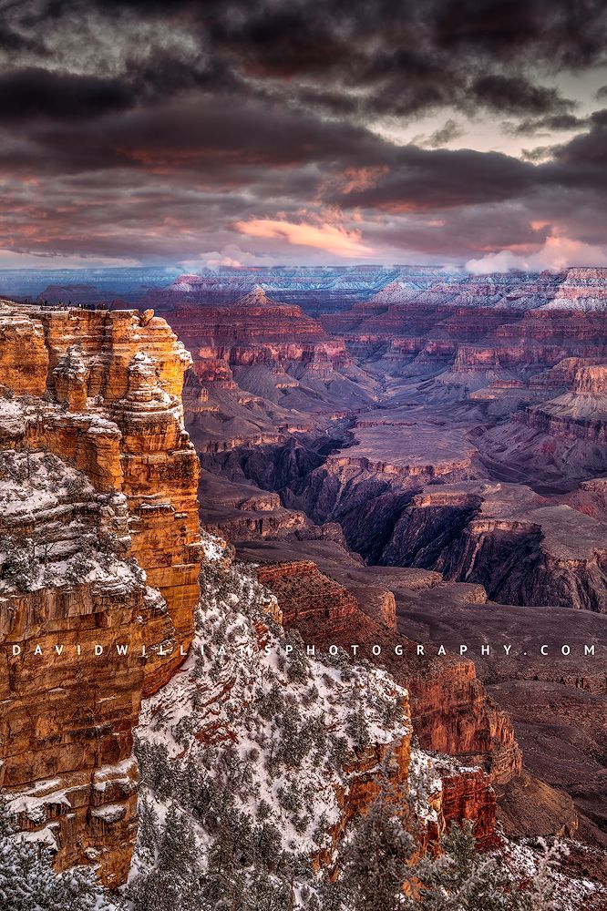 Vertical photo of the Grand Canyon South Rim at sunrise with light snow in winter, captured as a fine art landscape print.