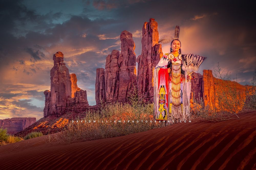 Navajo girl in ceremonial clothing at Totem Pole, Monument Valley