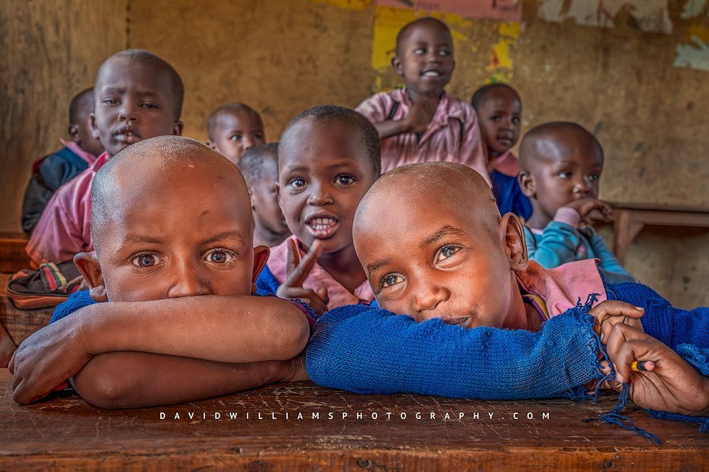 Kenyan children in an elementary classroom in morning light