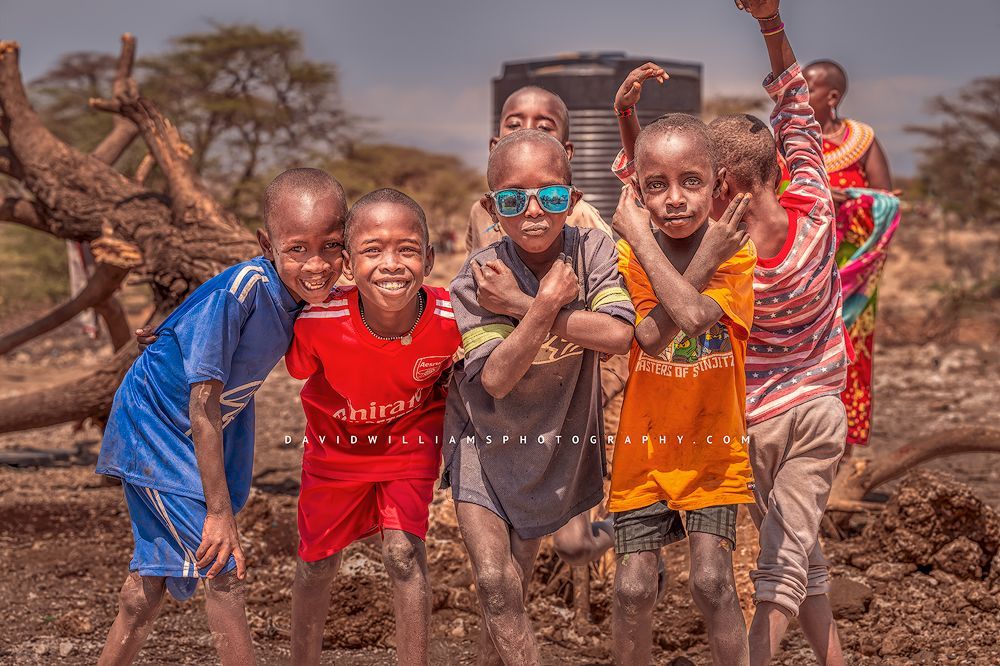 Happy Maasai children smiling and playing